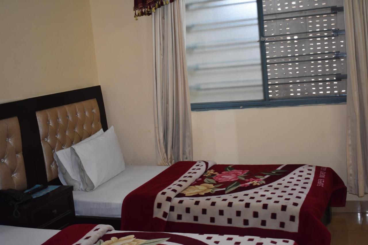 Hotel Sky Inn Rawalpindi Bagian luar foto